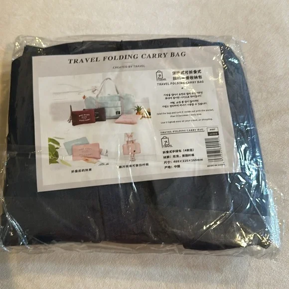 Travel bag - nylon zippered - Navy color remaining.  New in package. - Picture 7 of 7